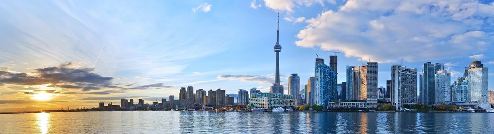 Panorama of Toronto skyline at sunset in Ontario, Canada.