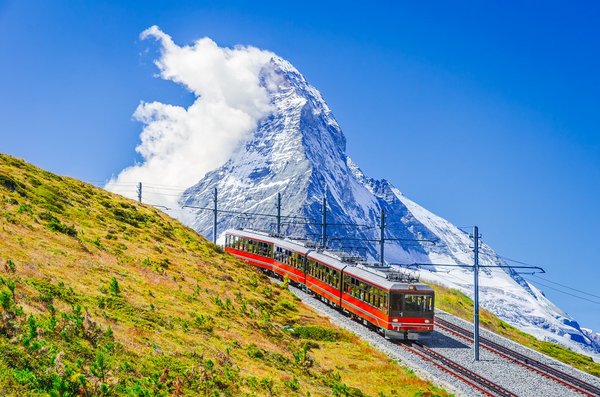 Zermatt, Switzerland. Gornergrat railway and Matterhorn pyramid-like mountain. Zermatt, Switzerland. Gornergrat railway and Matterhorn pyramid-like mountain.