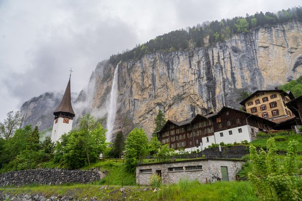 Lauterbrunnen, Village in Switzerland, in the Swiss Alps, Beautiful Valley with rocky cliffs and Waterfalls, Known as the Land of 72 Waterfalls Lauterbrunnen, Village in Switzerland, in the Swiss Alps, Beautiful Valley with rocky cliffs and Waterfalls, Known as the Land of 72 Waterfalls